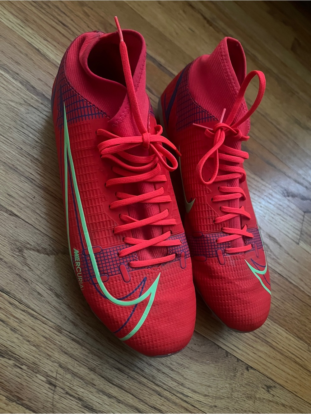 Nike Red Soccer Cleats with Neon Green Accents